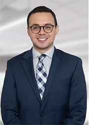 Photo of City Attorney Justin Tamayo