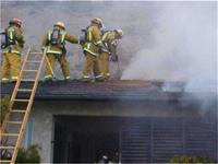 Firefighters on roof